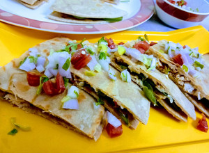 A picture of Chicken Quesadillas with Pico de Gallo.