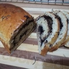 A picture of Poppy seed bread with chocolate ganache filling.