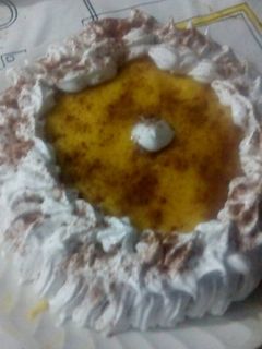 Una foto de Tarta de natilla y merengue con canela