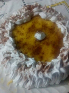 Una foto de Tarta de natilla y merengue con canela