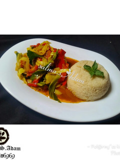 A picture of Cous Cous and cabbage sauce by salma.s.Adam(ful@rny"ss kitchen).