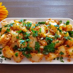 A picture of Mandvi Batata Khichdi (Peanuts Aloo Khichdi).