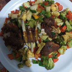 A picture of Cauliflower and broccoli stir fry.