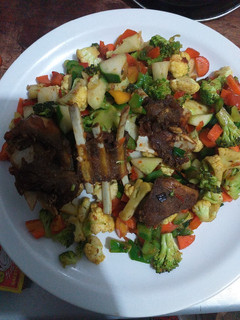 A picture of Cauliflower and broccoli stir fry.