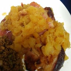 A picture of Fried Ham steaks with Crushed Pineapple.