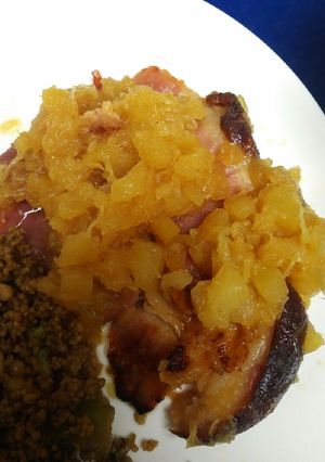 A picture of Fried Ham steaks with Crushed Pineapple.