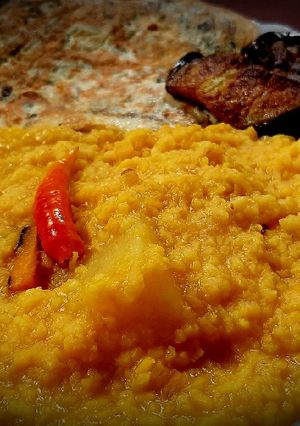 A picture of Rainy day platter- khichdi, Omelette and fried brinjal.