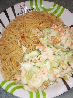 A picture of Spaghetti with coleslaw.