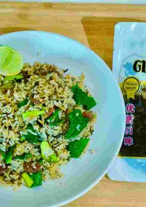 A picture of How to Make 'Kao Pad Kana Chai' (Fried Rice with Preserved Mustard Greens) by Chada – Featuring Preserved Mustard Greens Slow-Cooked for 6 Hours as a Premium Ingredient.