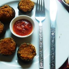 A picture of Aromatic flavorful healthy baked stuffed Mushrooms.