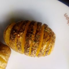 A picture of Rosemary Hasselback potatoes.