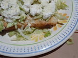 Tacos dorados rellenos de papá con chorizo
