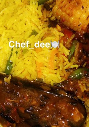 A picture of Indian fried rice with corn nd fish soup.