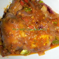Fried chicken in ketchup sauce A picture of Fried chicken in ketchup sauce.