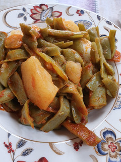 Una foto de Judías con patatas