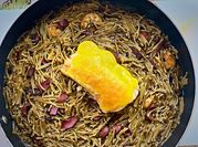 Una foto de calamares en su tinta