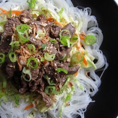 A picture of Rice Vermicelli with Beef and Coleslaw.