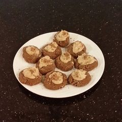 A picture of Chocolate Shrtbread Cookies Filled with Caramel Buttercream.