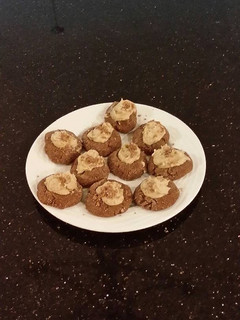 A picture of Chocolate Shrtbread Cookies Filled with Caramel Buttercream.