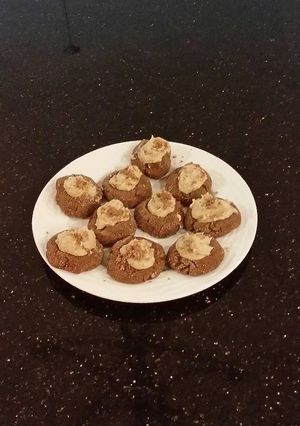 A picture of Chocolate Shrtbread Cookies Filled with Caramel Buttercream.