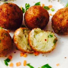 A picture of Leftover rice cheesy balls.