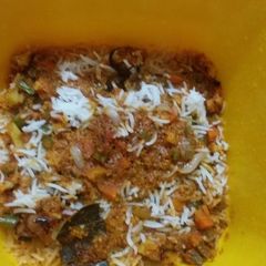 Shahi dum biryani in microwave A picture of Shahi dum biryani in microwave.