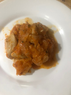 Una foto de Pollo encebollado