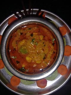 A picture of Capsicum and Corn ki sabzi.