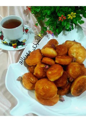عکسی از دستور کیک قاشقی با طعم هل و گلاب