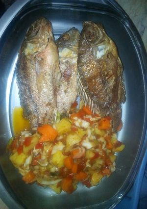 A picture of Fish and sauce.