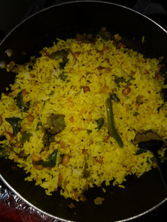 A picture of Lemon rice with onions.