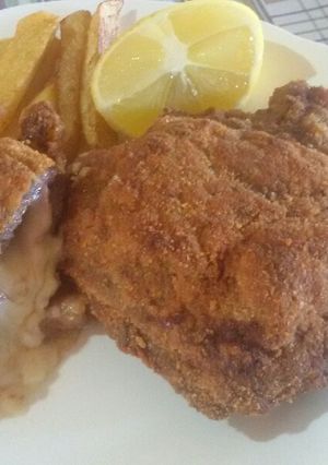 Una foto de Milanesa de Peceto rellena de jamón y muzzarella
