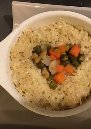Une photo de Riz aux épices et parmesan cœur de petits légumes