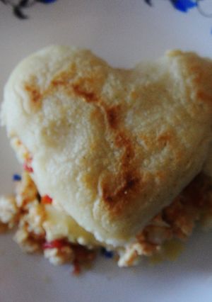 Una foto de Arepas: Caracas y la tostada