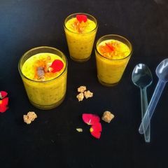 A picture of Tapioca pudding with rose, walnuts and carrots.