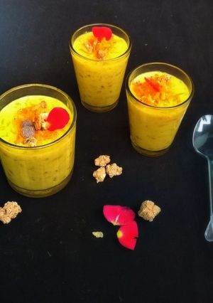 A picture of Tapioca pudding with rose, walnuts and carrots.