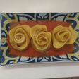 Rose di pasta fresca con ripieno di patate e salsiccia