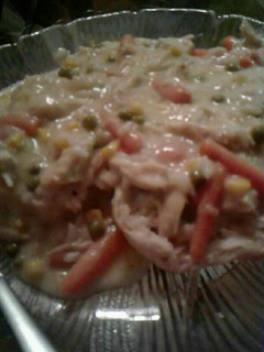 A picture of Chicken&rice with veggies.