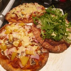A picture of Naan bread pizzas.