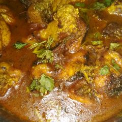 A picture of Rui macher jhol / Rohu fish curry.