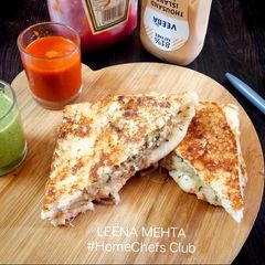 A picture of Caramelized Schezwan Aaloo Masala Sandwich.