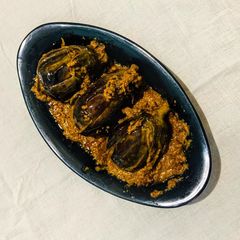 A picture of Badanekayi Yennegayi stuffed brinjal curry.