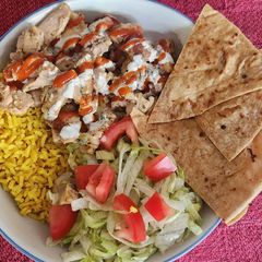 A picture of Street Cart Style Chicken and Rice with White Sauce.