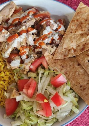 A picture of Street Cart Style Chicken and Rice with White Sauce.