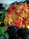 Gratín de vegetales bañados con leche al ajo y canela