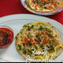 A picture of Eggy and Veggie Uttappam.