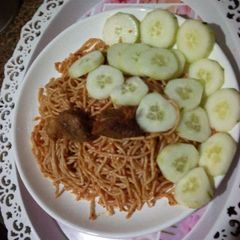 A picture of Jollof spaghetti.