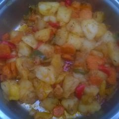 A picture of Potatoes salad with robot peppers.