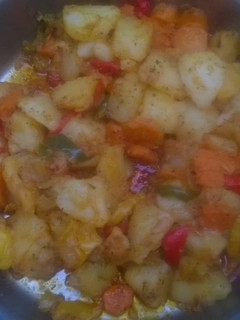 A picture of Potatoes salad with robot peppers.