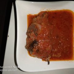 A picture of Cat fish in sauce.